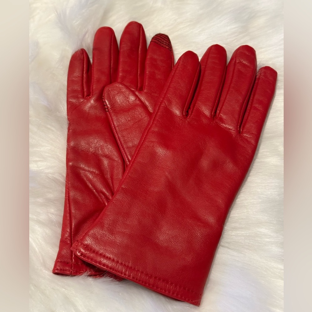 Red leather gloves.
